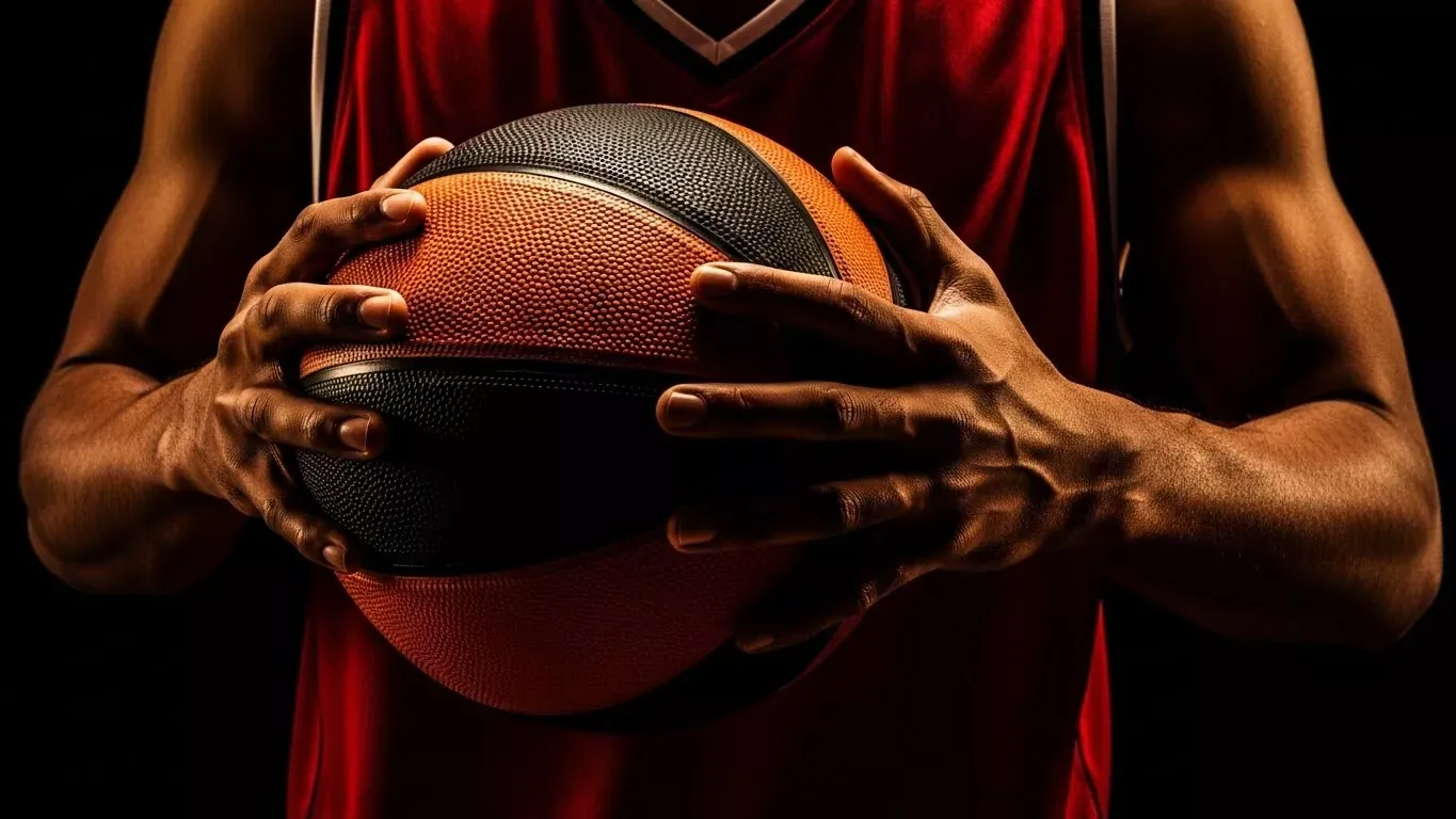 Closeup of basketball player gripping basketball